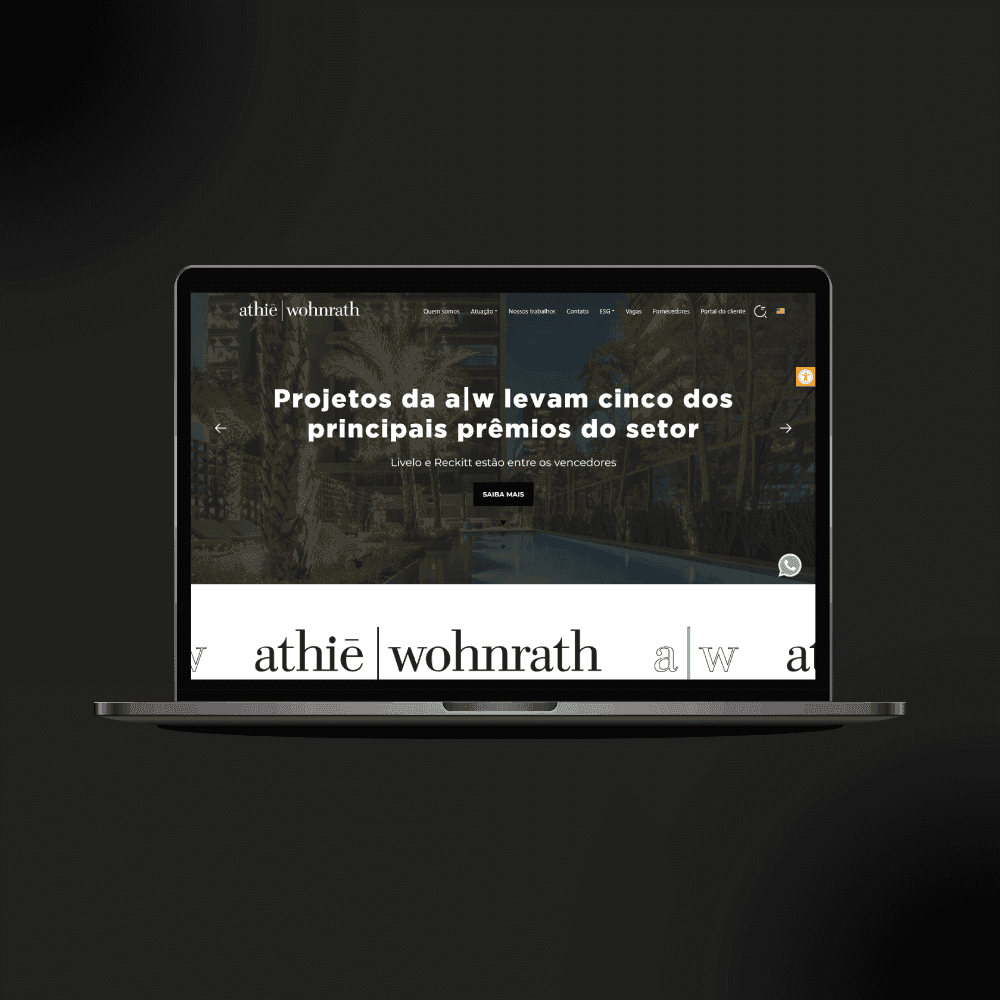 Home do site da Athié Wohnrath exibida em um notebook